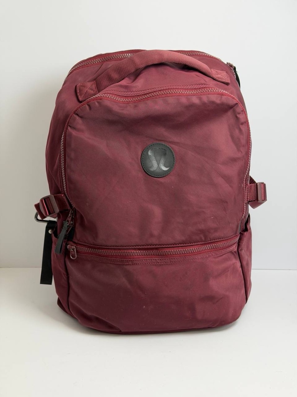 Lululemon New Crew Backpack 22L in the deep red Merlot colorway